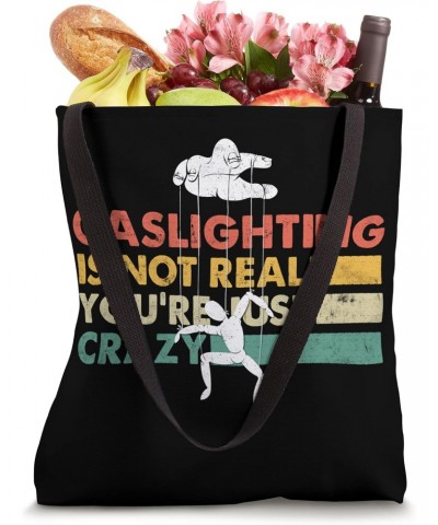 Funny Shirt - Gaslighting Is Not Real You're Just Crazy Tote Bag $12.01 Totes